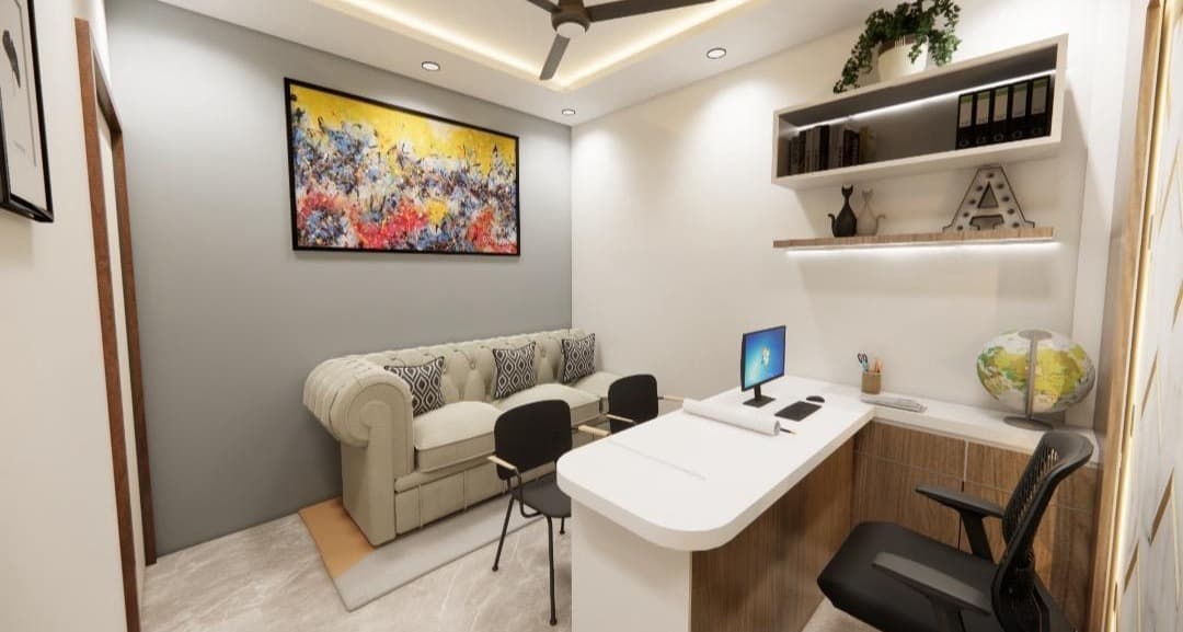 Executive consultation lounge with chesterfield sofa and floating shelf joinery