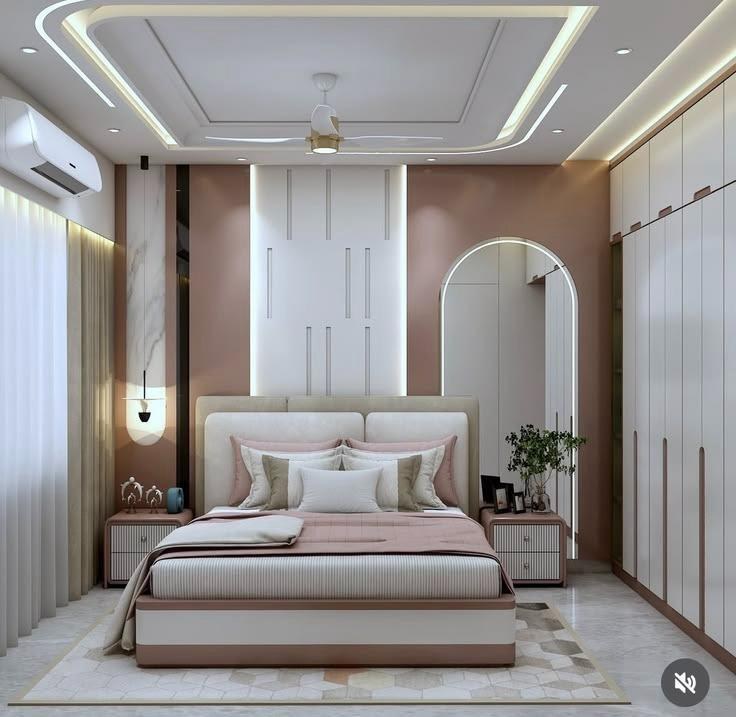 Blush rose master bedroom with arched illuminated mirror and floor-to-ceiling built-in wardrobe in Bhopal